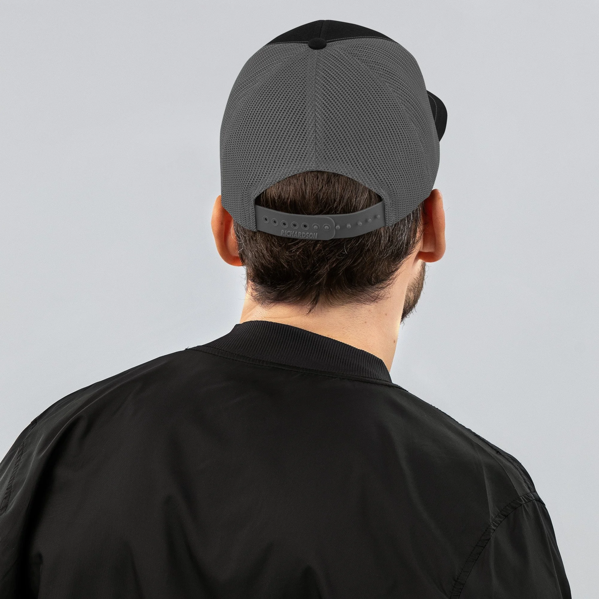 snapback-trucker-cap-black-charcoal-back-68b31fd684acc.jpg