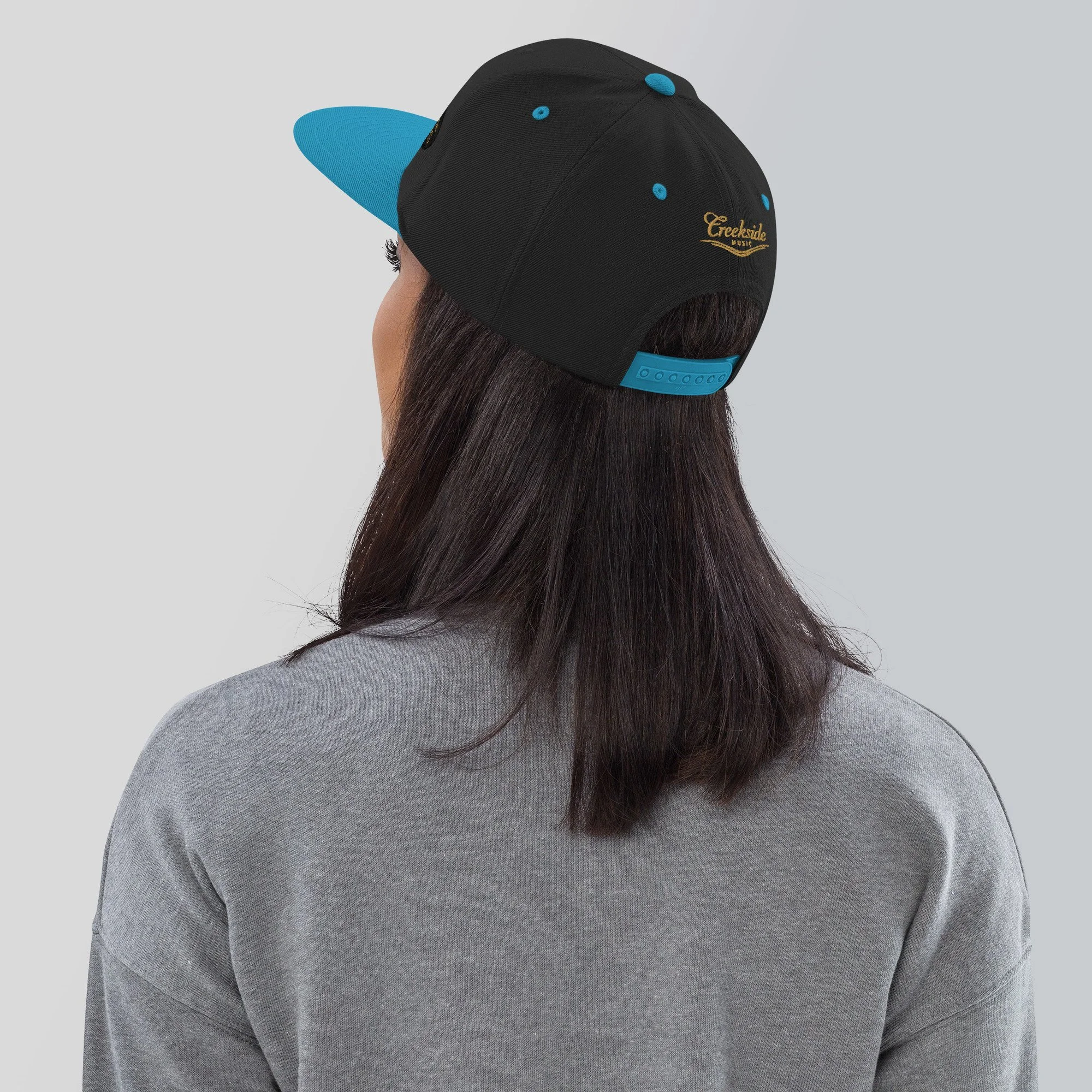 classic-snapback-black-teal-back-68b4529468828.jpg