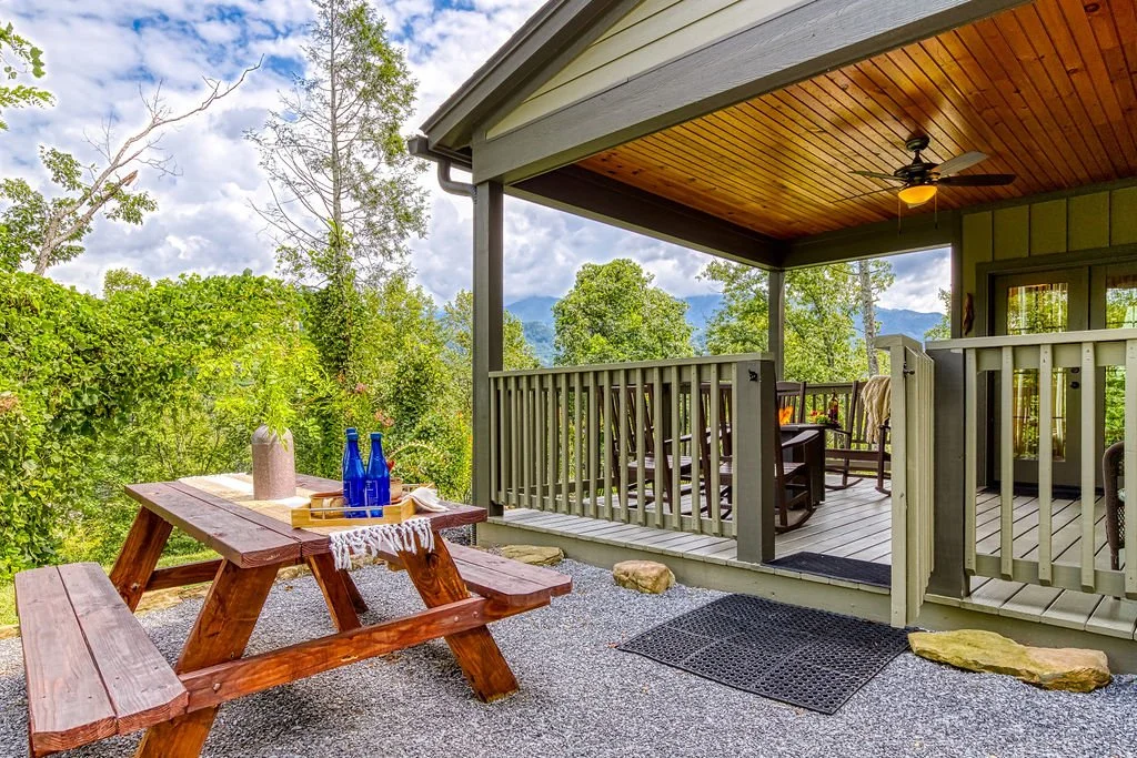 Living Color Cabin picnic table off the back porch. 
