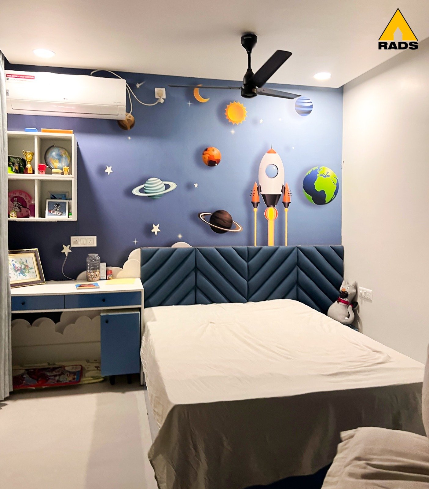 Minimalist bathroom design with floating vanity, round basin, and ambient lighting – RADS interior design in Northeast India.