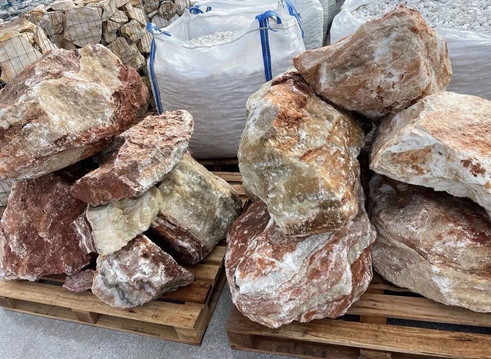 Wholesale Red Onyx landscape rocks with rust cream and white banding