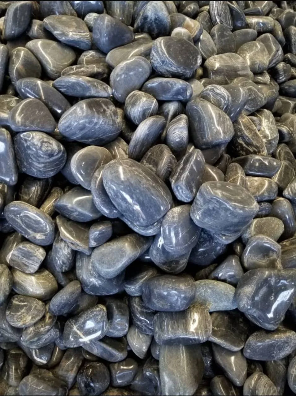 Black High Polished Pebbles with glossy charcoal surfaces