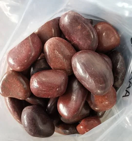 Wholesale Red High Polished Pebbles in burgundy brick-red and brown tones