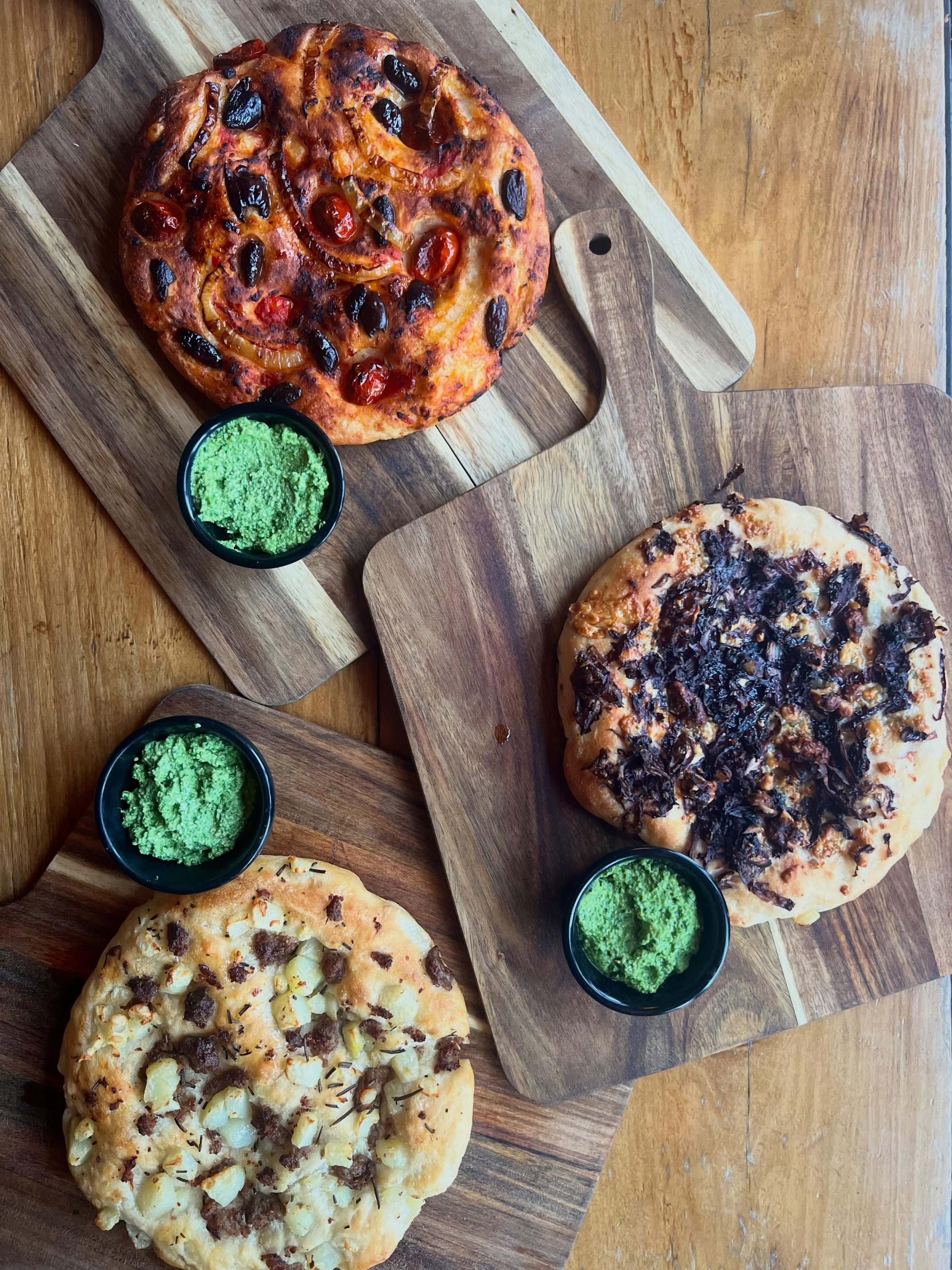 Our housemade focaccias are one of the best ways to start your meal..

Try any or all 3 today! Classico (kalamata olive, cherry tomato and red onion), sausage and potato or radicchio and gorgonzola. 

Buon apetito! Reservations on our website, walk i