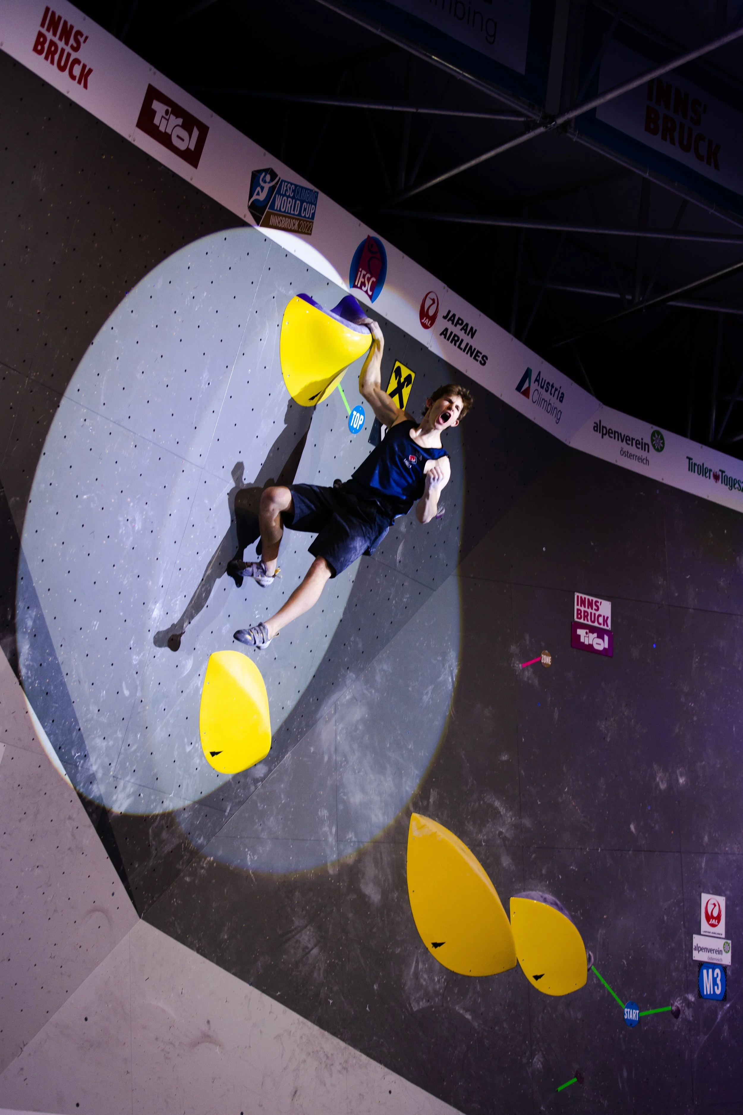 ABC alumnus and Olympic climber Colin Duffy competing in a bouldering final in Innsbruck