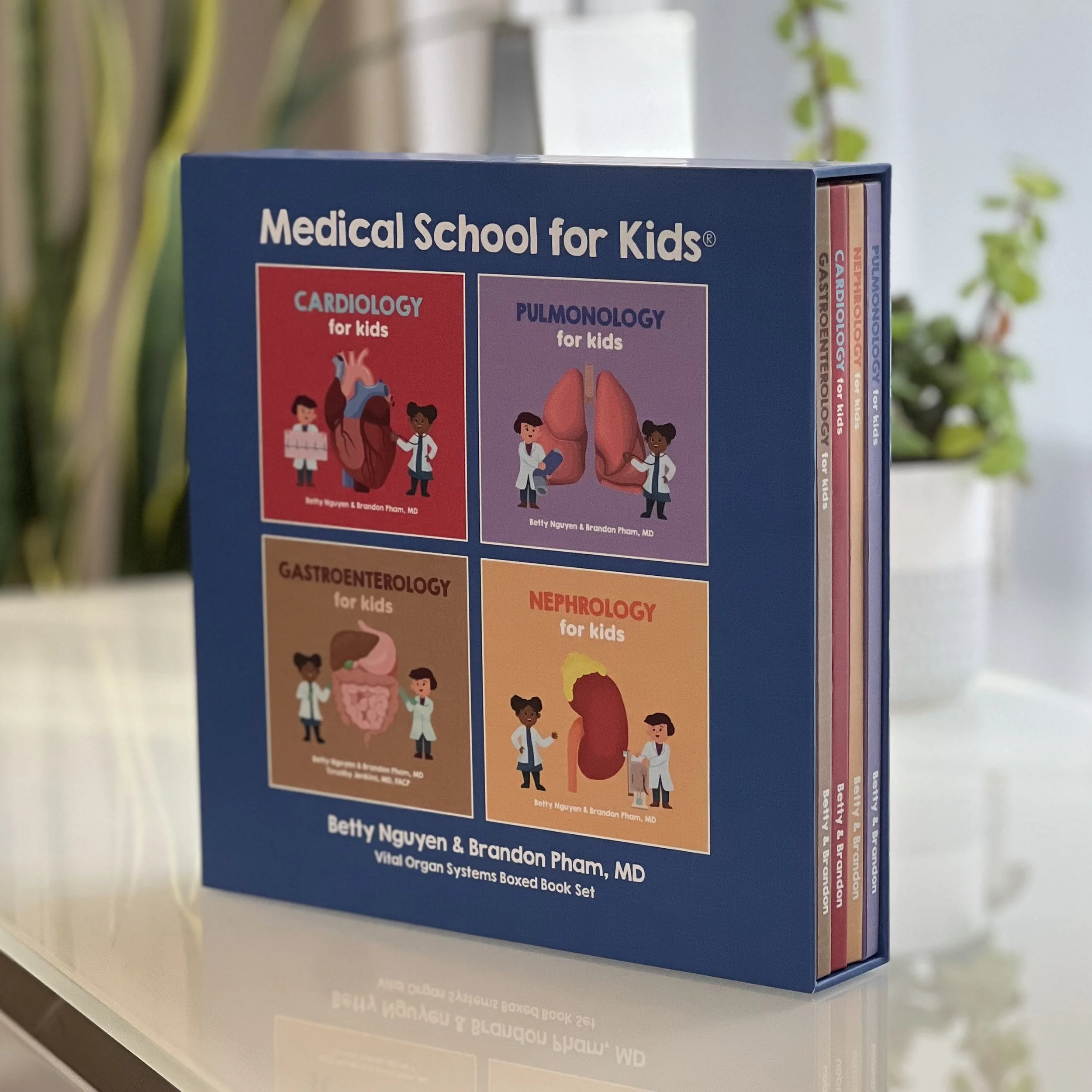 Box set of children's medical books featuring illustrations of vital organs, including heart, lungs, digestive system, and kidneys, with titles on cardiology, pulmonology, gastroenterology, and nephrology.