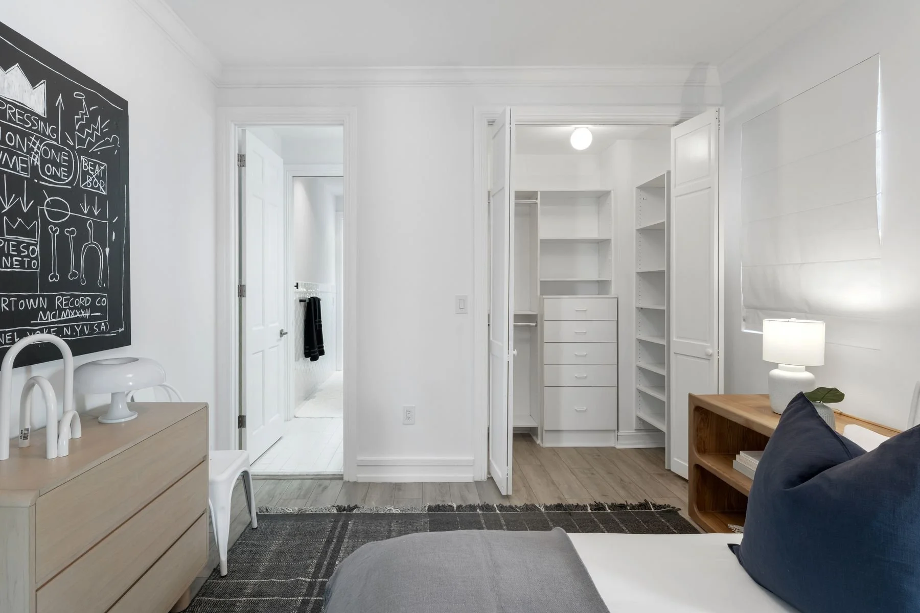 Bedroom (2) with built-in closet cabinetry; 9 ft ceilings; access to Jack and Jill bath