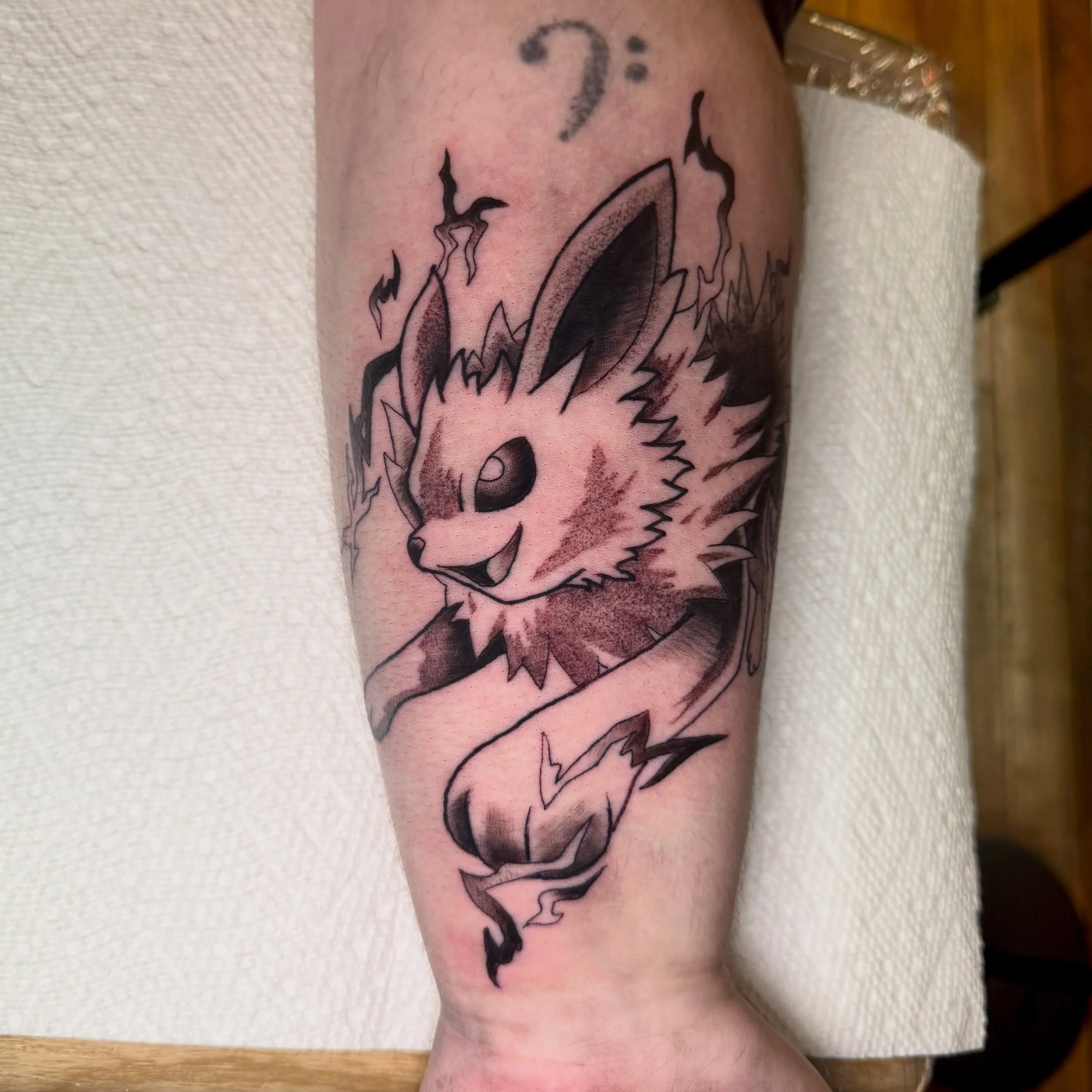Cross another off the list! Jolteon from yesterday! 
Keep &lsquo;em coming! 
#pokemontattoo #jolteontattoo #blackandgray #mntattooartist #minneapolistattooartist