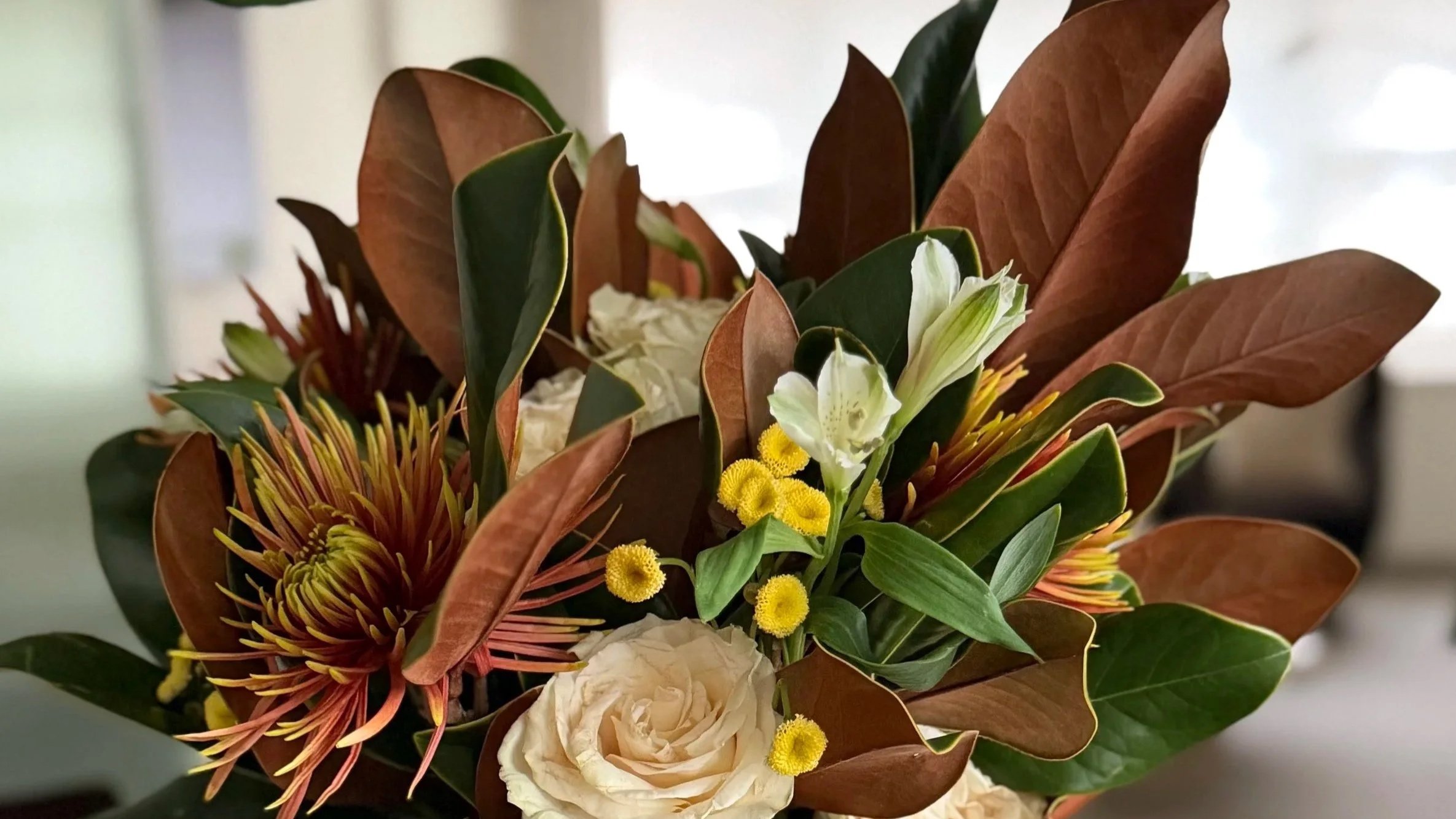 Luxury seasonal floral arrangement curated by Cleaning By Design.