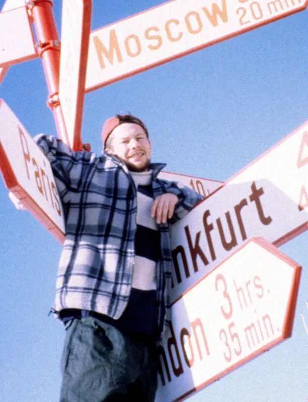 Ian Wright leaning on signposts
