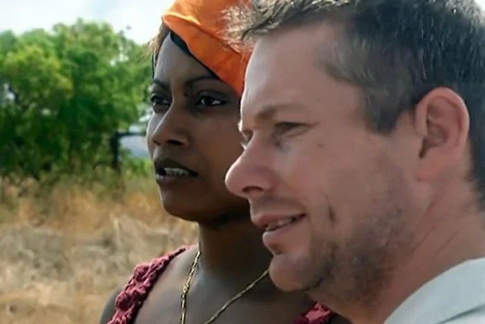 Ian talking with a woman from Madagascar