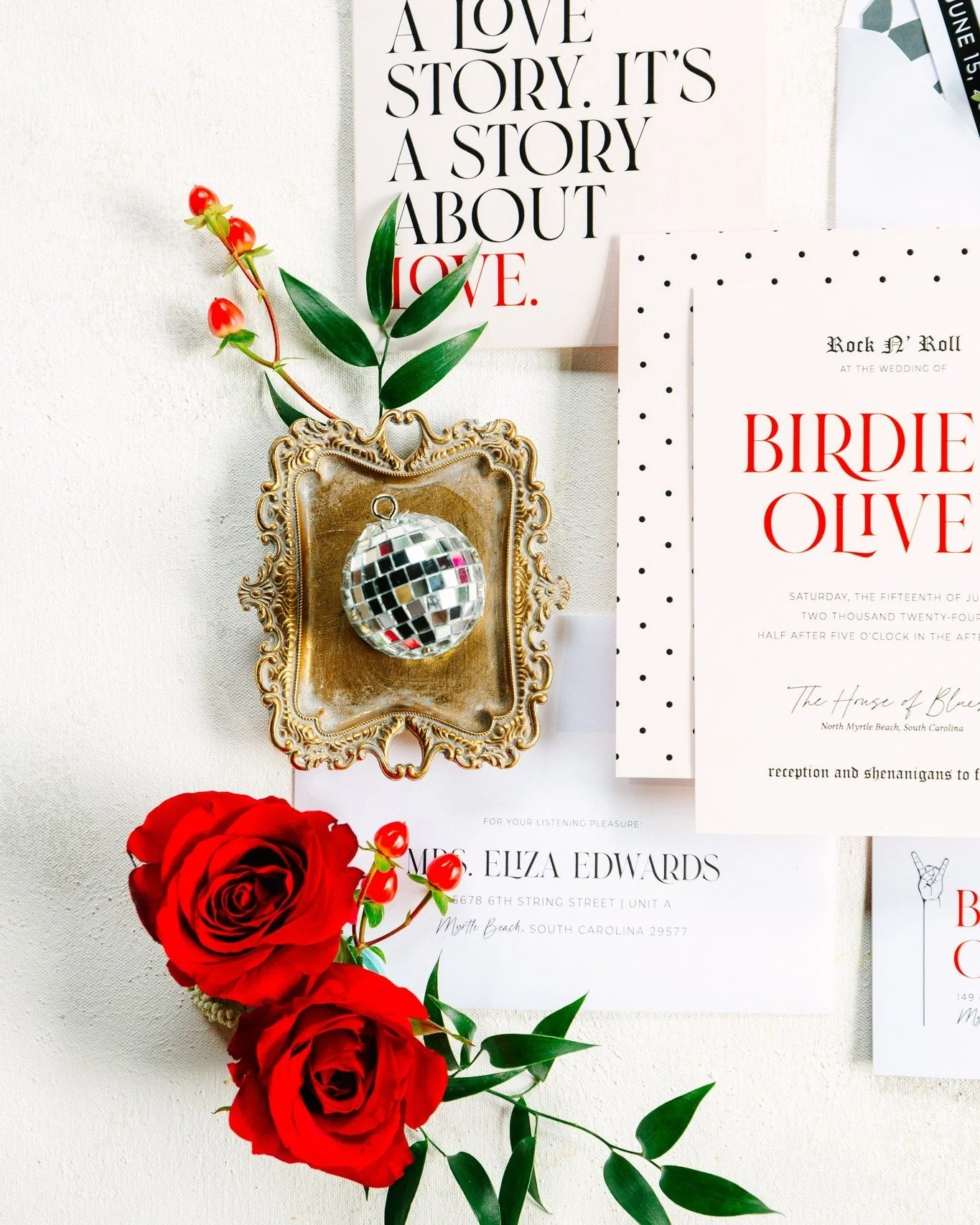 This is not a love story. This is a story about love. 

When a rock and roll themed styled shoot is presented to you, I will absolutely say yes. This valentine-inspired shoot was full of fun typography, concert ticket placecards, record album menus, 