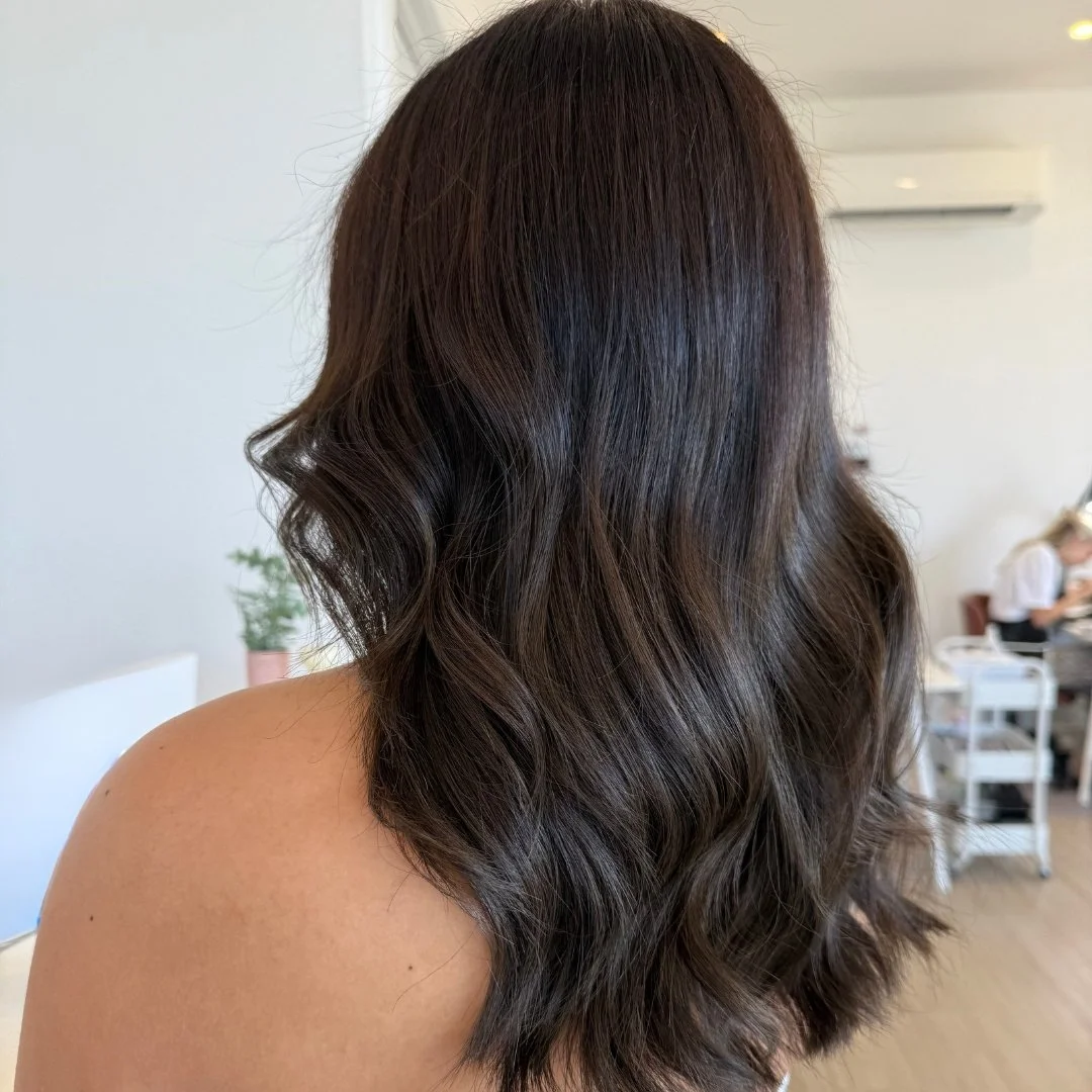 Glossy Brunette Hair With Waves
