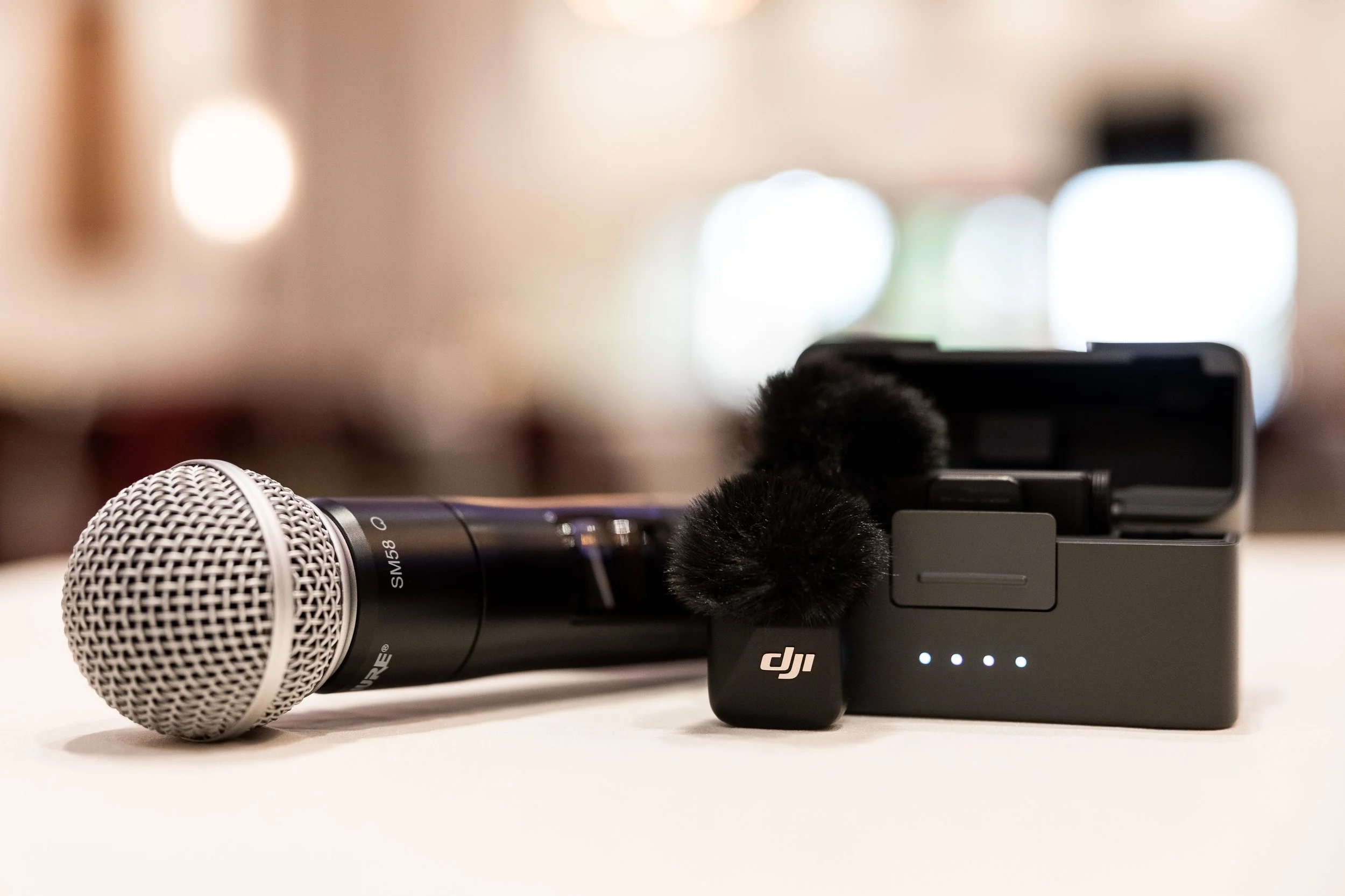 Professional wireless microphone setup including handheld mic and lapel system for speeches, officiants, and announcements at events by DJ Bam.