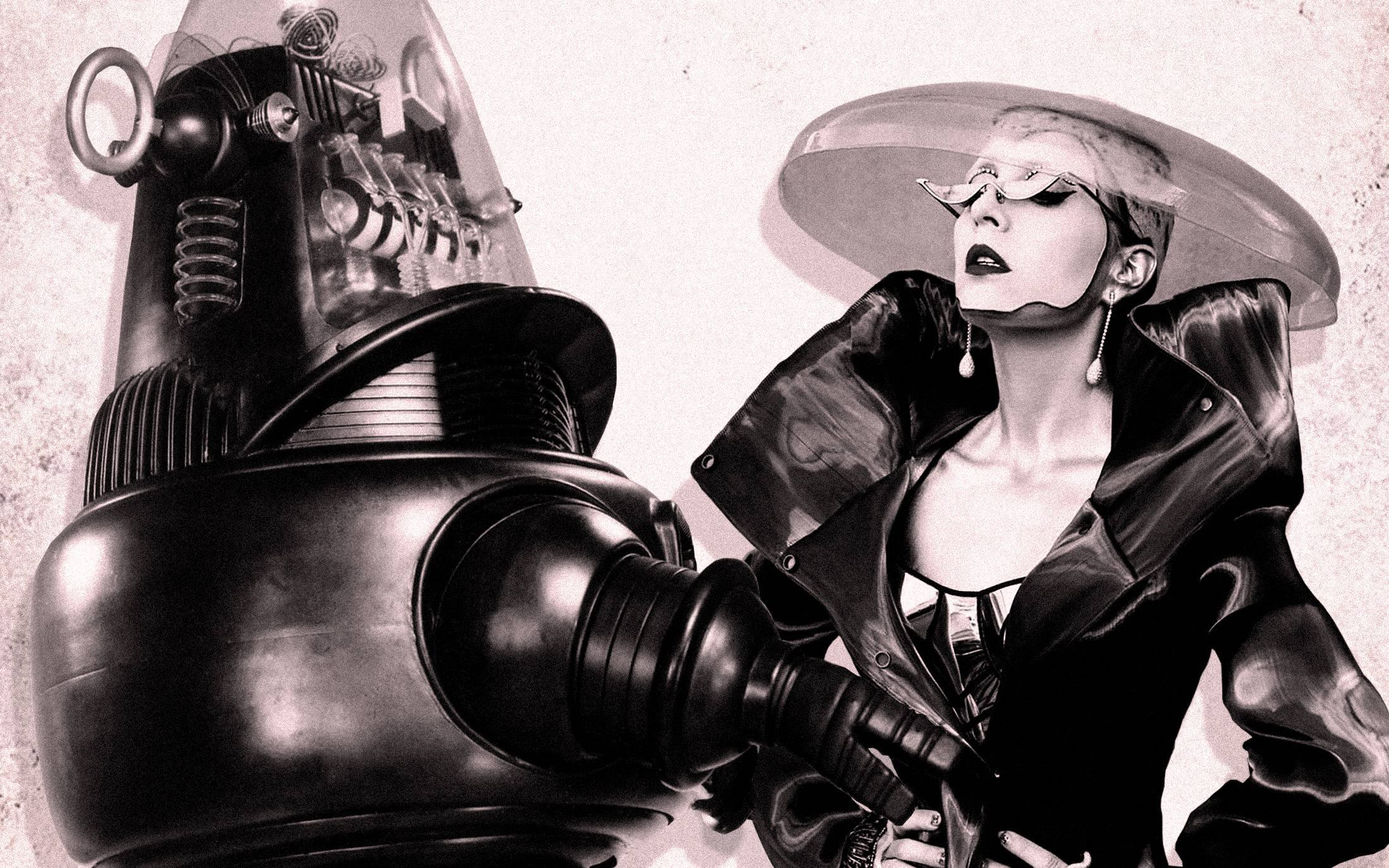 woman looking at a robot