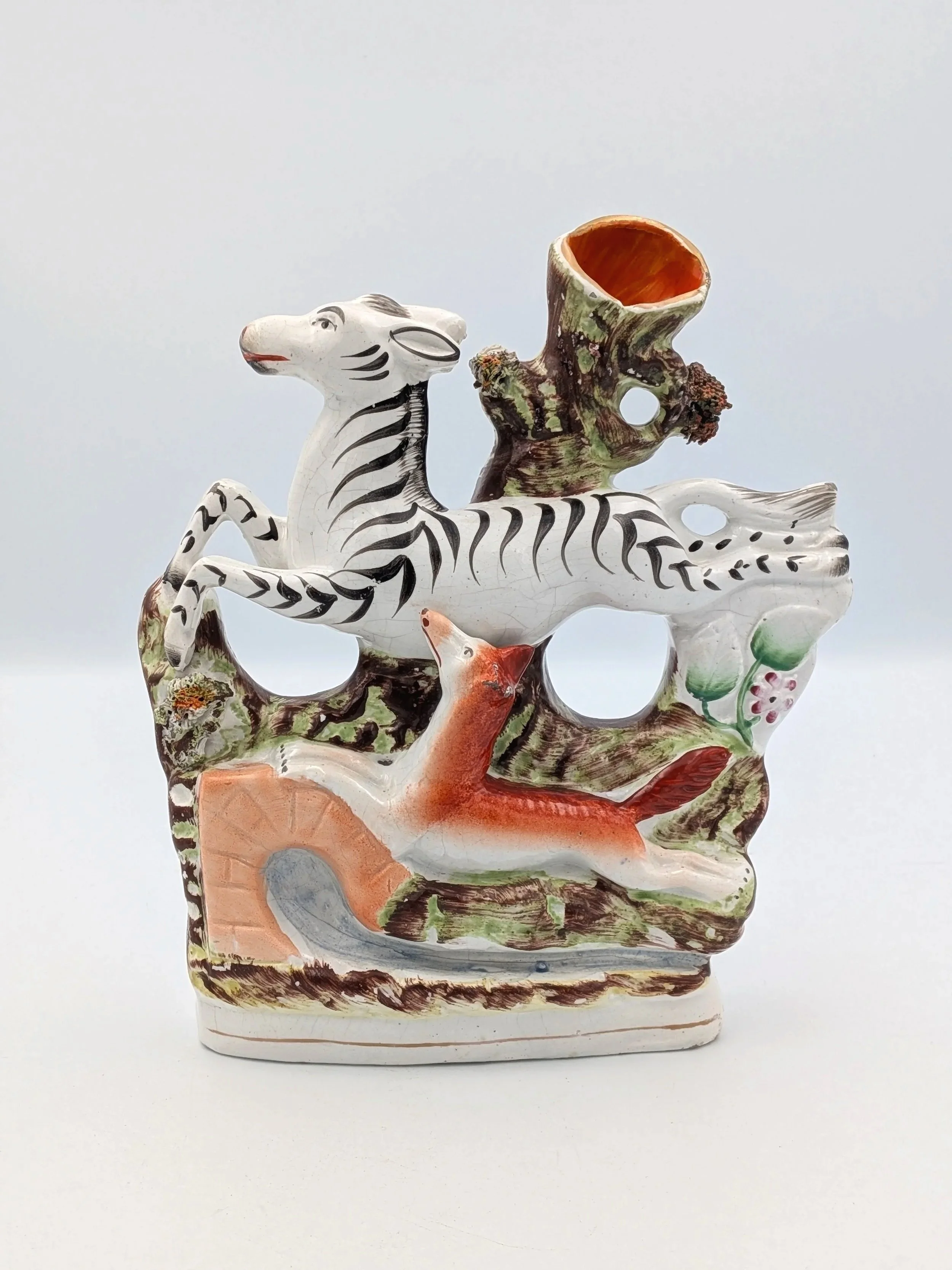 Zebra Chased by a Fox