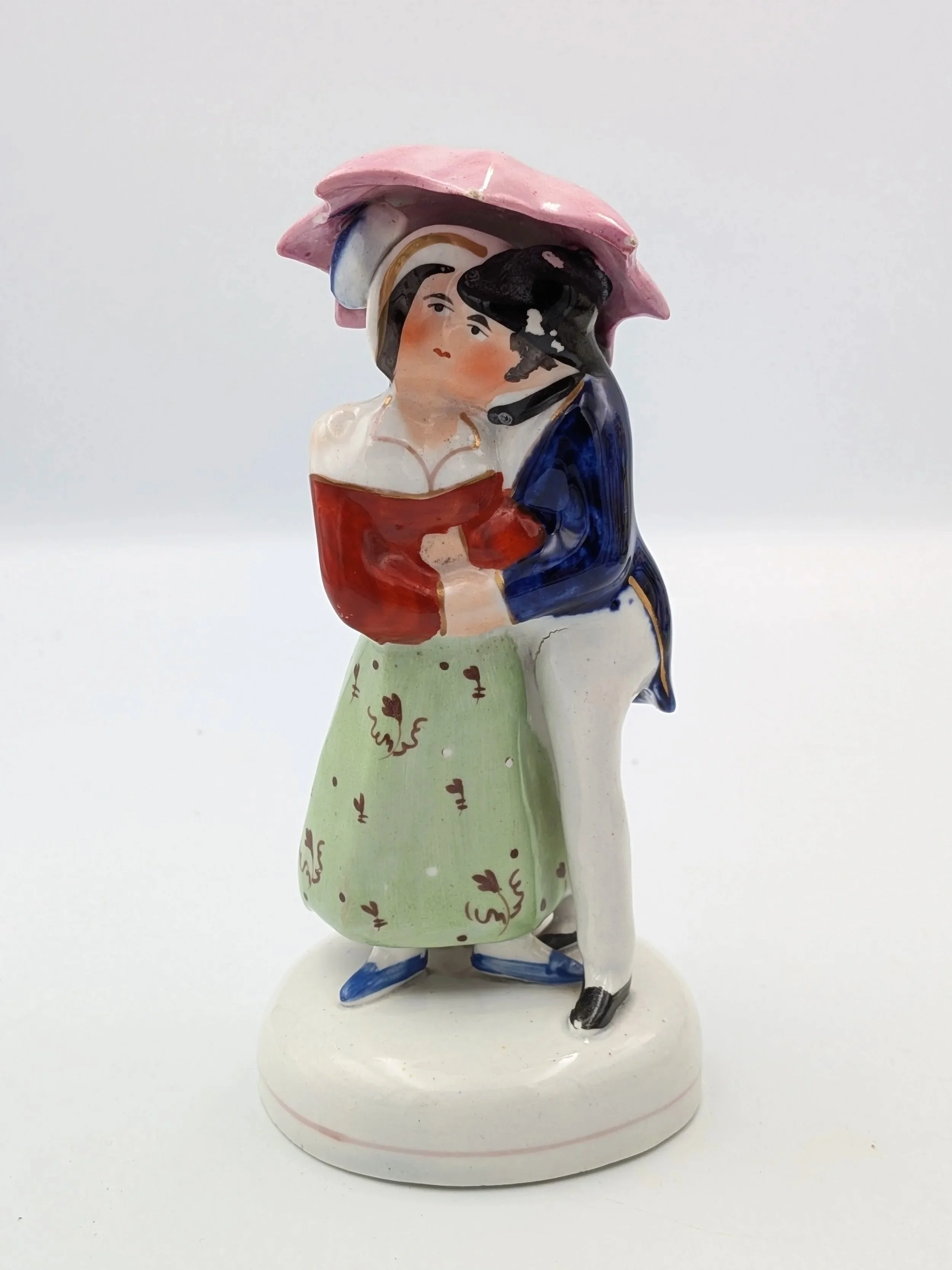Kissing Couple with Umbrella