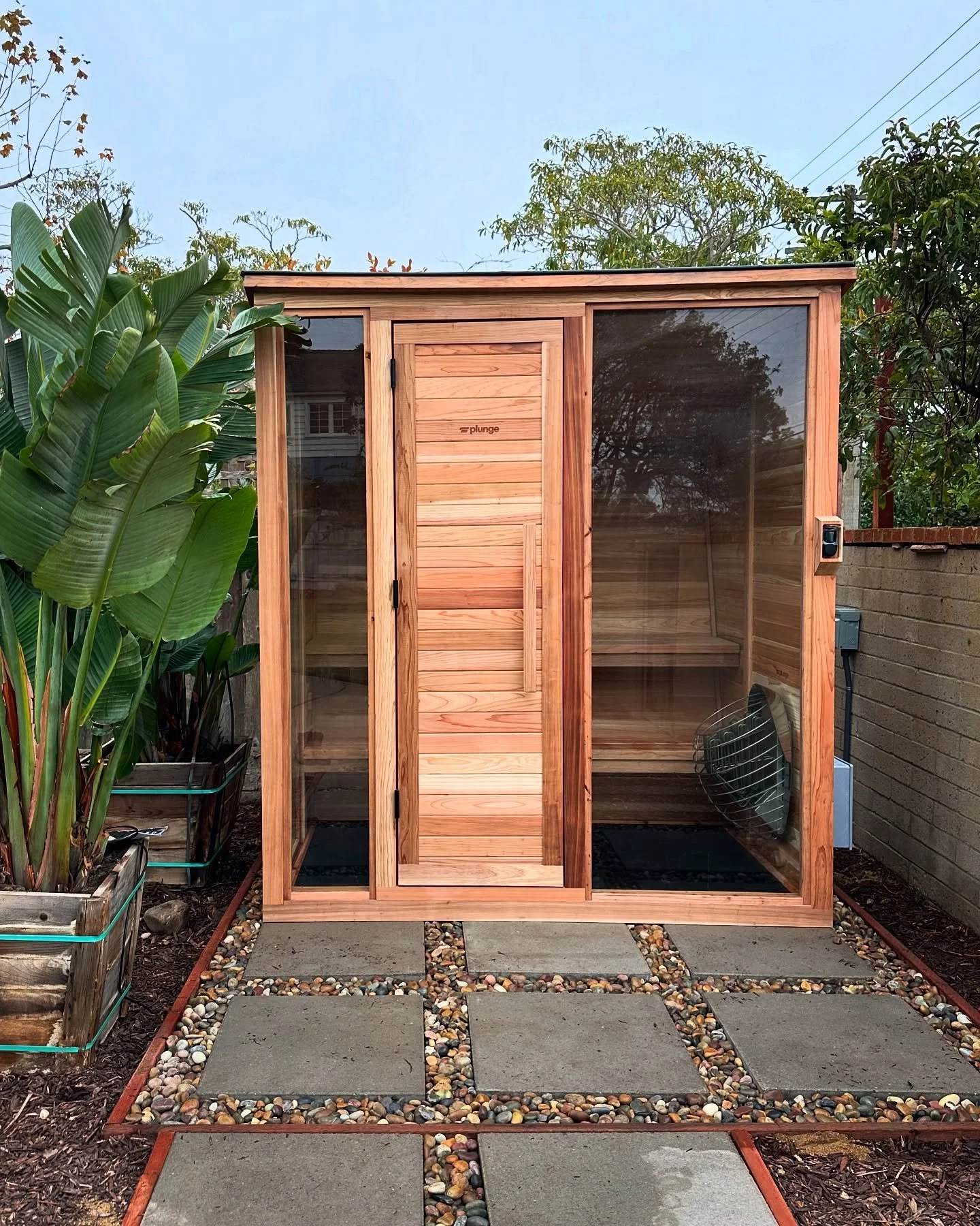 Saunas are IN, and YKB can install one in your own backyard! Hire YKB to prepare your yard and build your @plunge sauna today!
