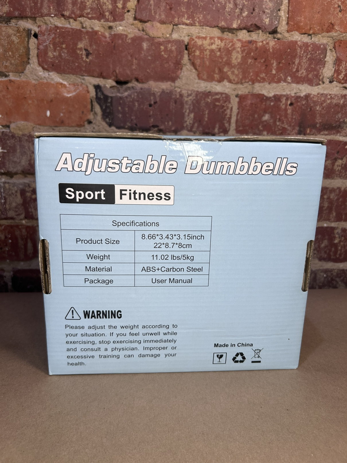 adjustable dumbbells box back.png