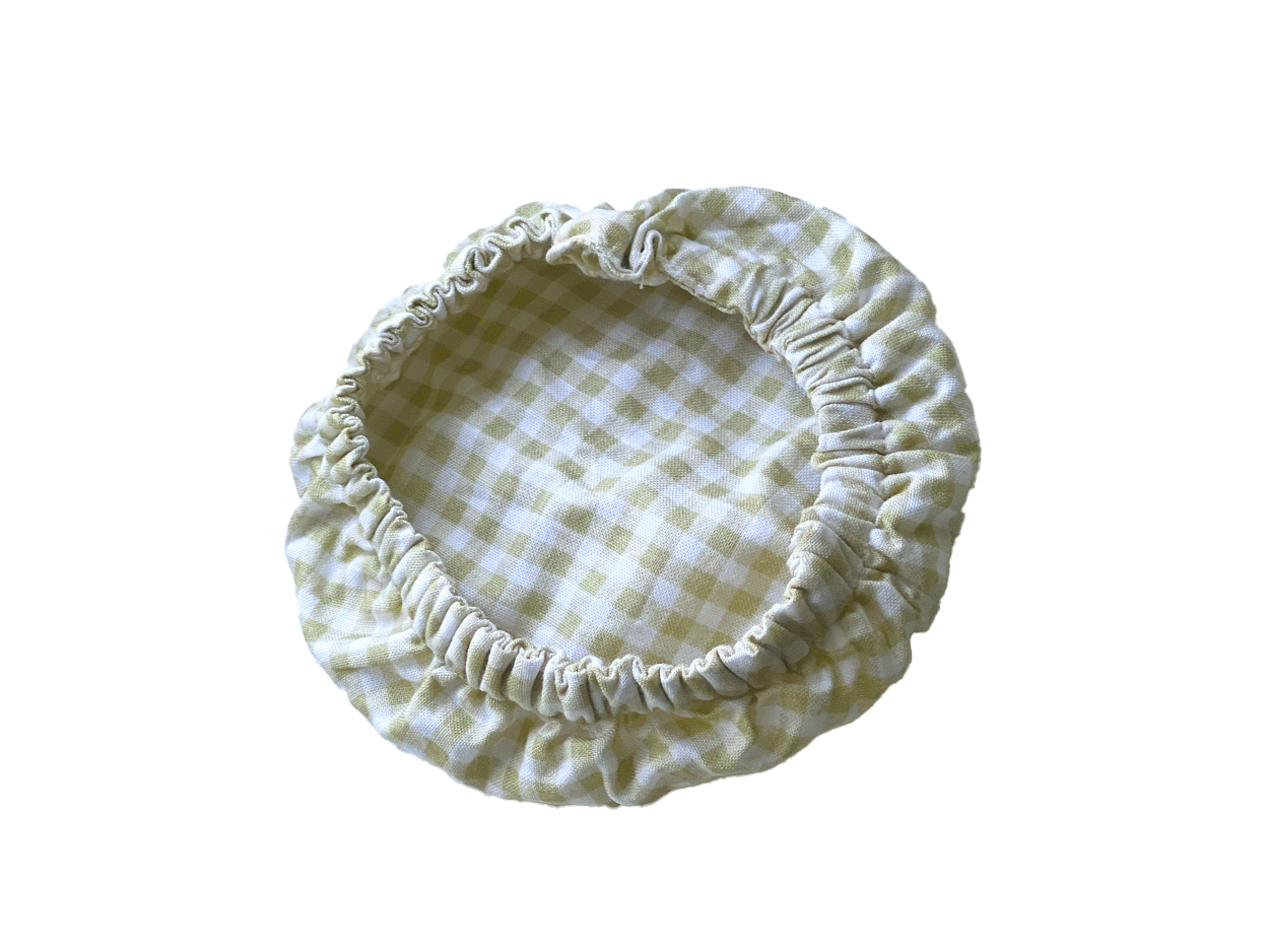 Reusable jar cover with vintage yellow gingham pattern.