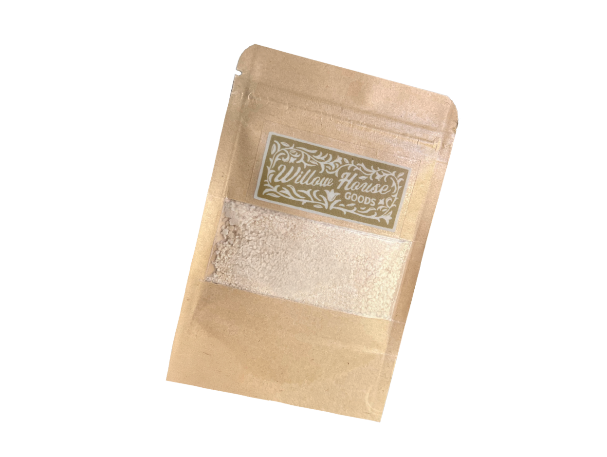 Kraft paper pouch with a transparent window showing white powdered substance, labeled 'Willow House GOODS'.