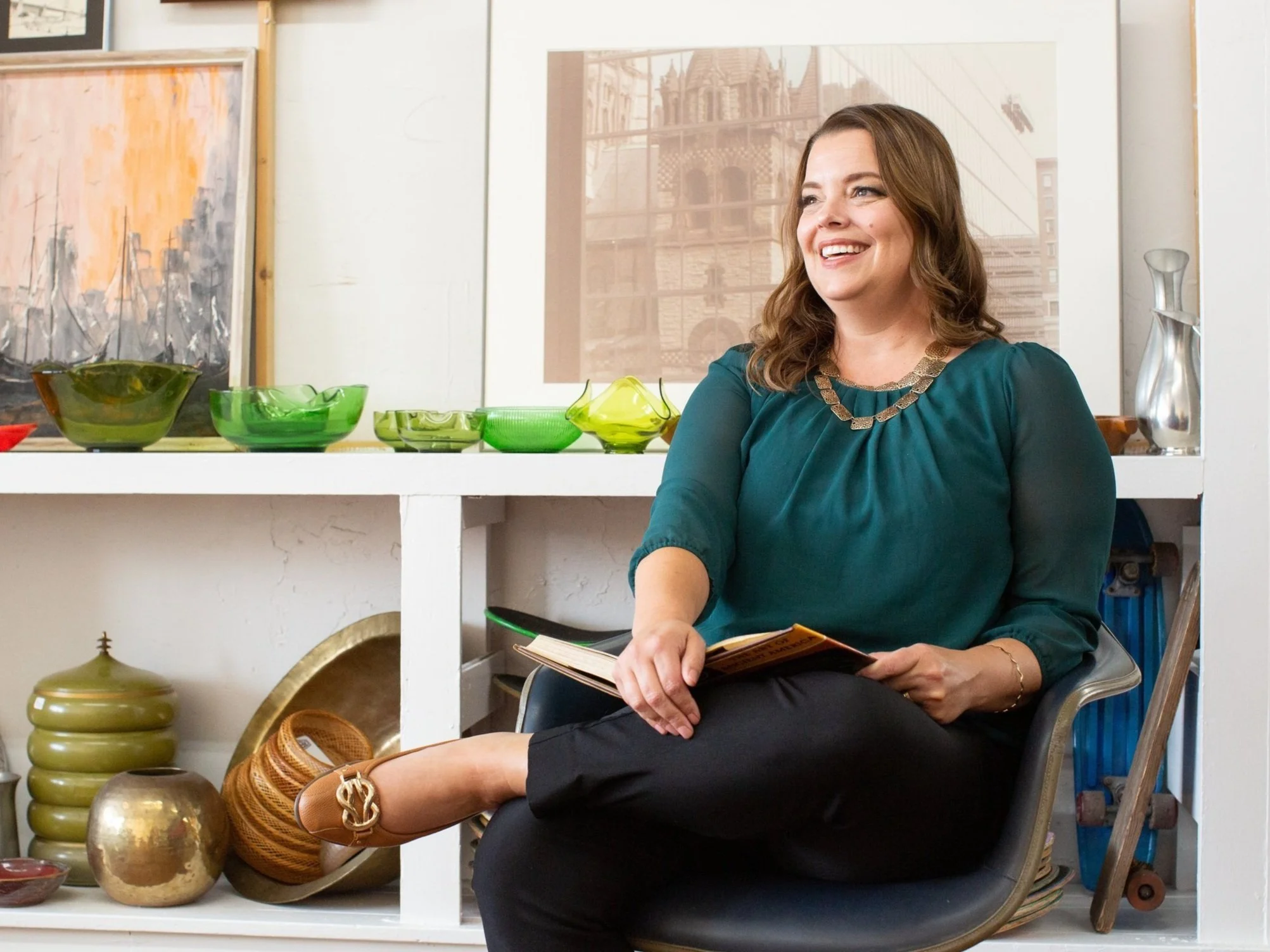 Danita Cummins, author and speaker, seated and laughing
