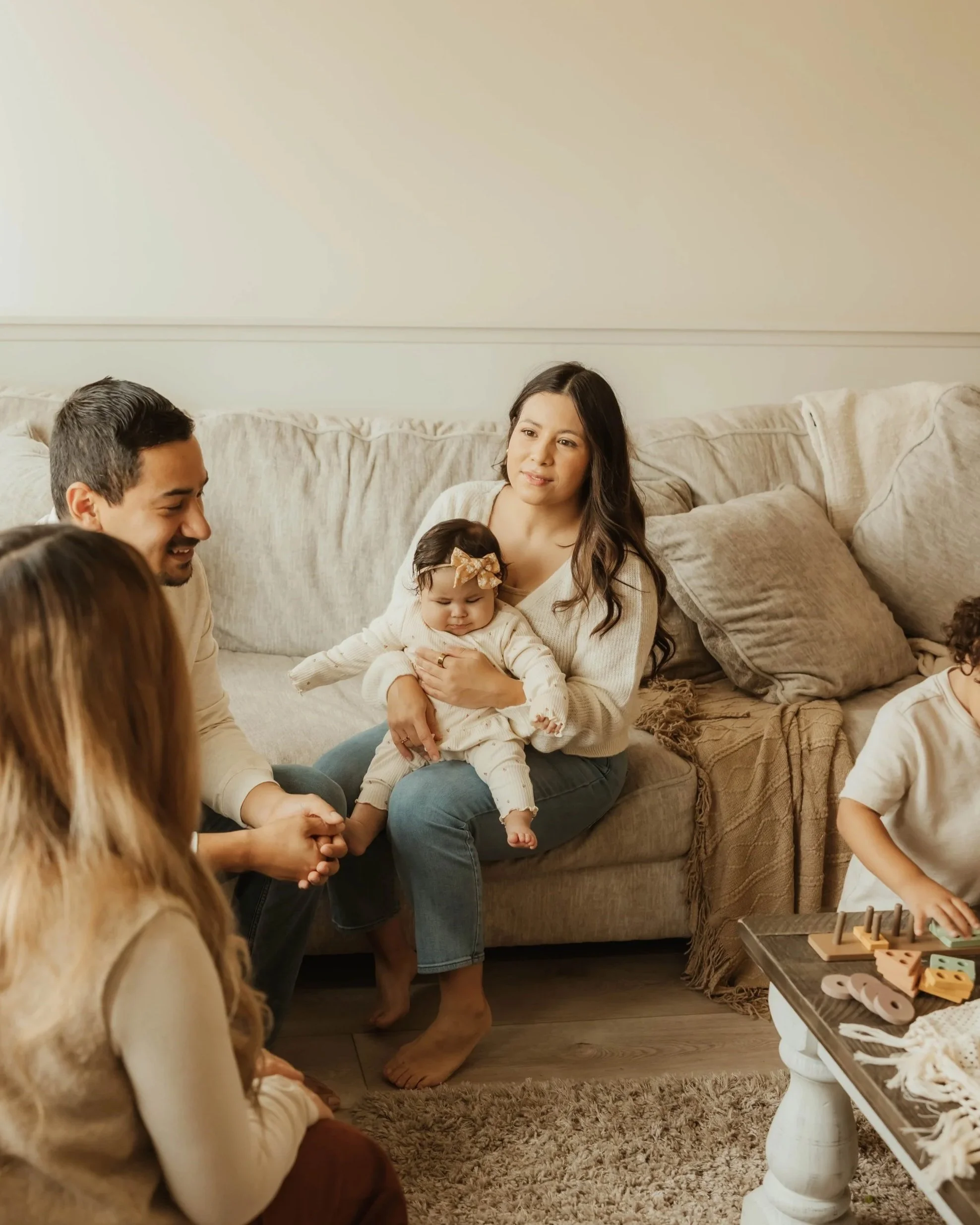 Dr. Salena Gallegos, OTD, OTR/L, spending meaningful time with children and families in a warm, playful environment that reflects connection, family wellness, and holistic occupational therapy rooted in everyday life.