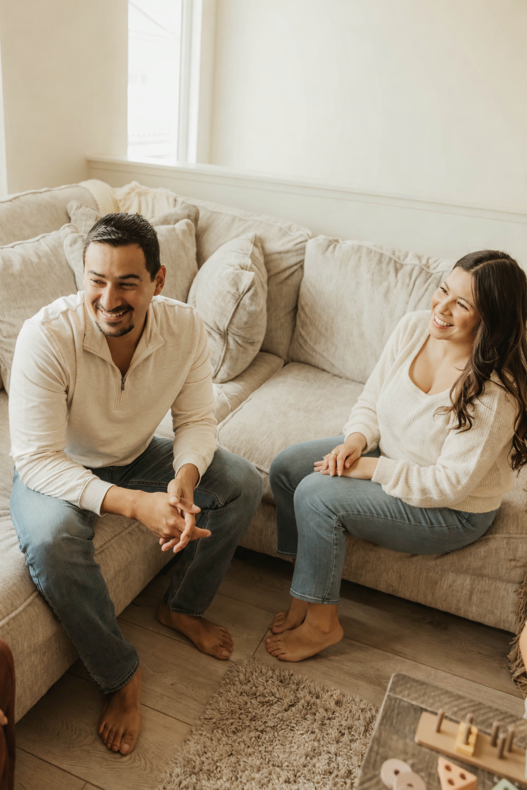 A couple engaging in a supportive conversation that reflects connection, communication, and emotional wellness. Occupational therapy at Root & Rhythm Holistic Care supports couples and families through life transitions, stress, and everyday routines.