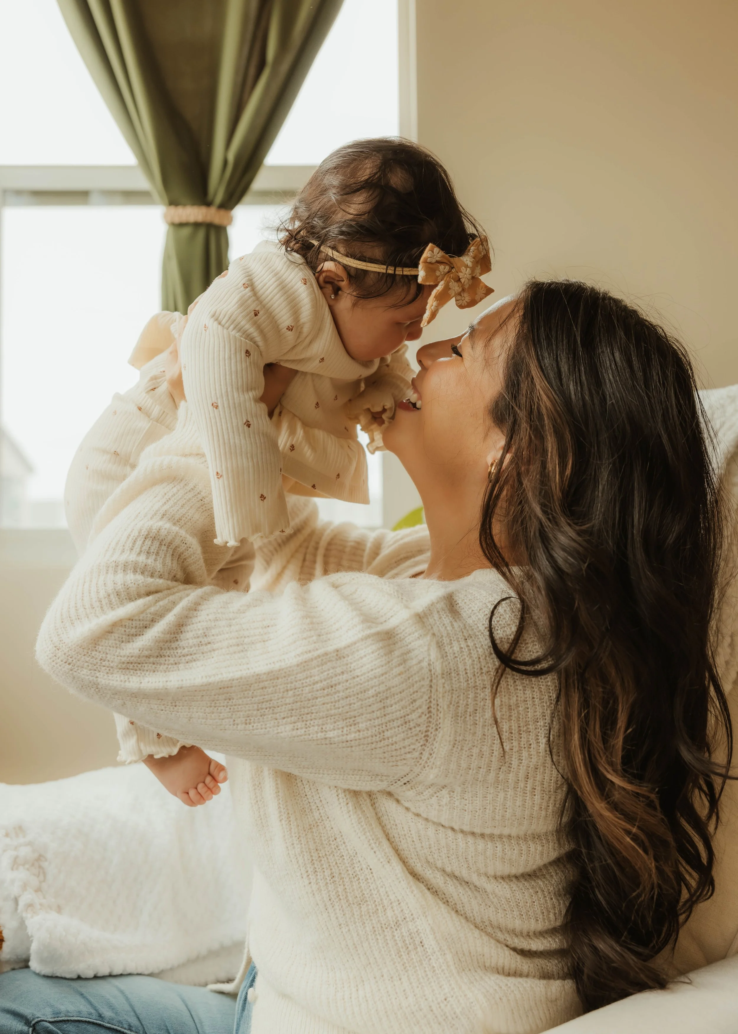 A caregiver and child sharing a meaningful moment that reflects connection, emotional wellness, nurturing relationships, and family-centered support through holistic and compassionate care.
