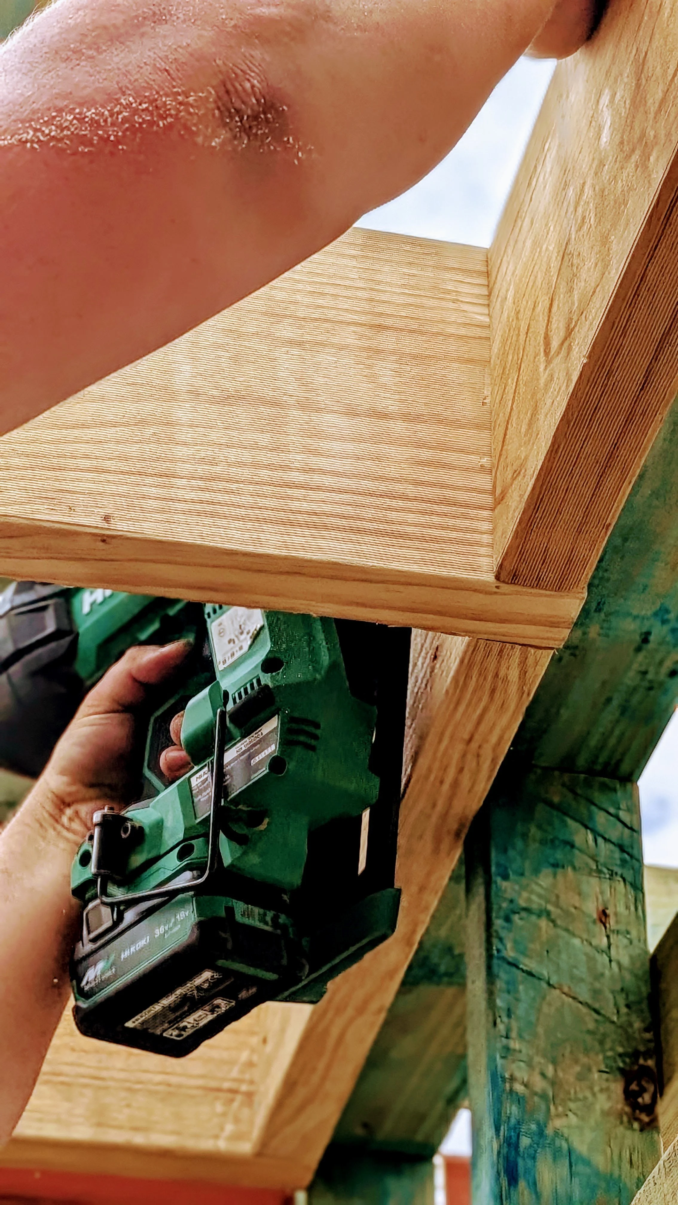 Licensed builder constructing timber frame for home golf simulator room.