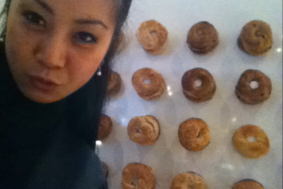 Robyn used to work a bunch of survival jobs in NYC. Here she is at a catering gig using a bagel wall as a step & repeat.