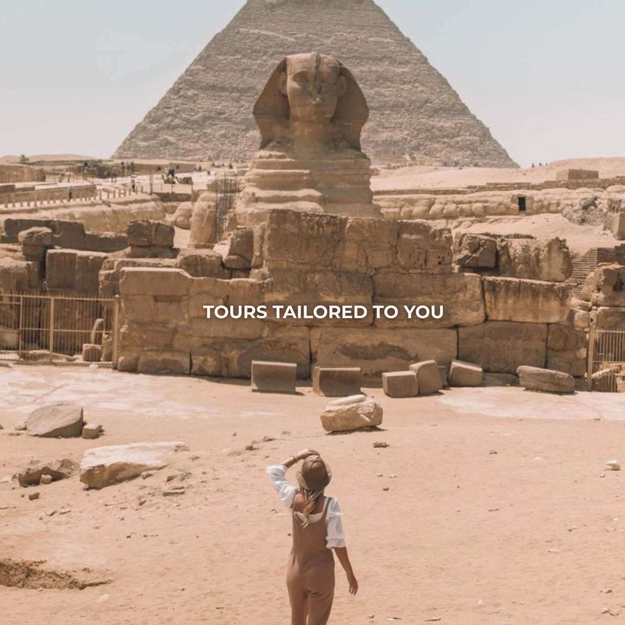A woman in a hat walking towards the Sphinx and pyramid at Giza, Egypt with the text 'Tours tailored to you' overlaid on the image.