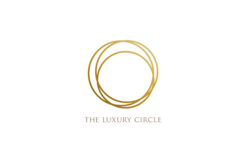 A logo featuring five interconnected gold circles above the text 'The Luxury Circle' in gold letters on a black background.
