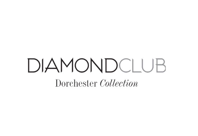 Logo for Diamond Club Dorchester Collection, featuring stylized diamond shapes above the text.