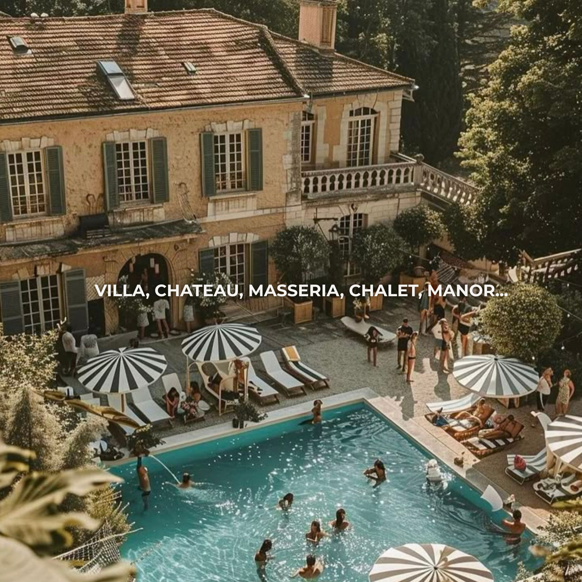 People swimming and relaxing poolside at a villa with a historic building and outdoor seating, shaded by striped umbrellas.