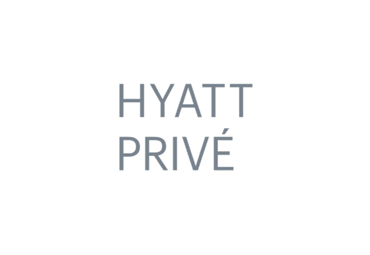 Logo of Hyatt Privé, a luxury hotel loyalty program, with a black background and gray text. Park Hyatt
