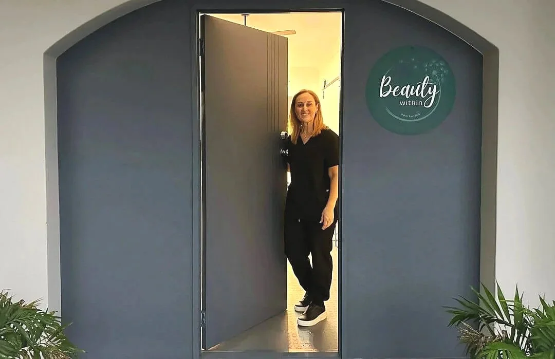Registered Nurse Jolieta welcoming clients to Beauty Within Aesthetics.