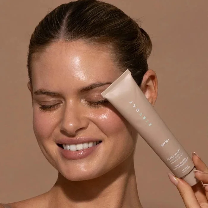 airyday-clear-as-day-fragrance-free-spf50-application.jpg
