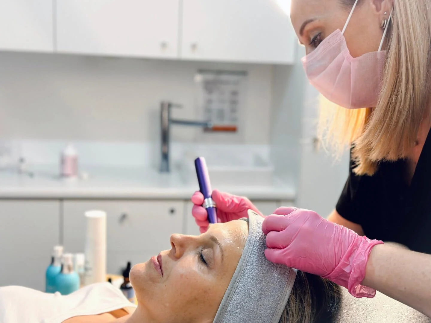 Professional microneedling treatment performed by Registered Nurse Jolieta.