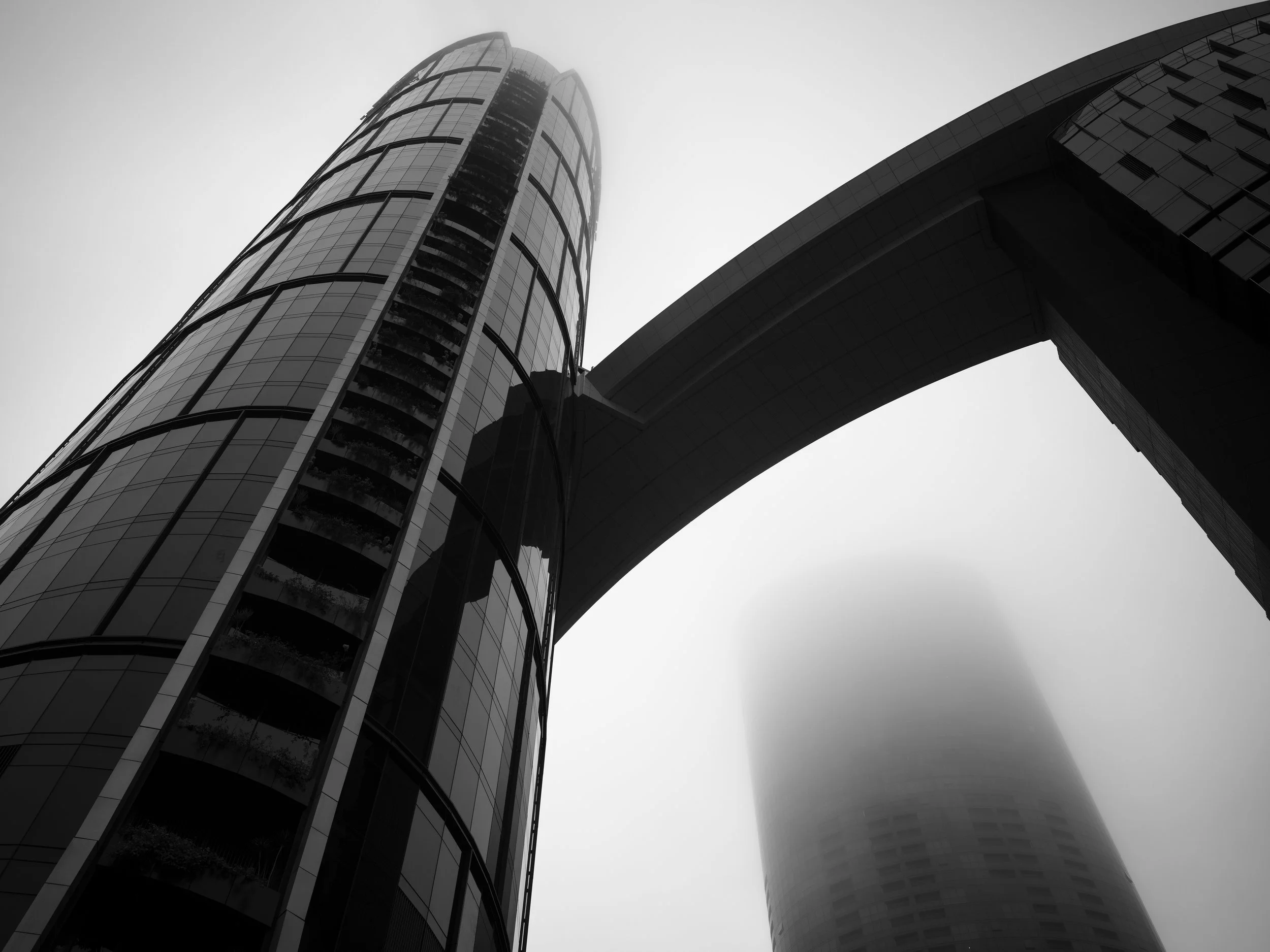 Black and white photo of Brisbane's cityscape in fog