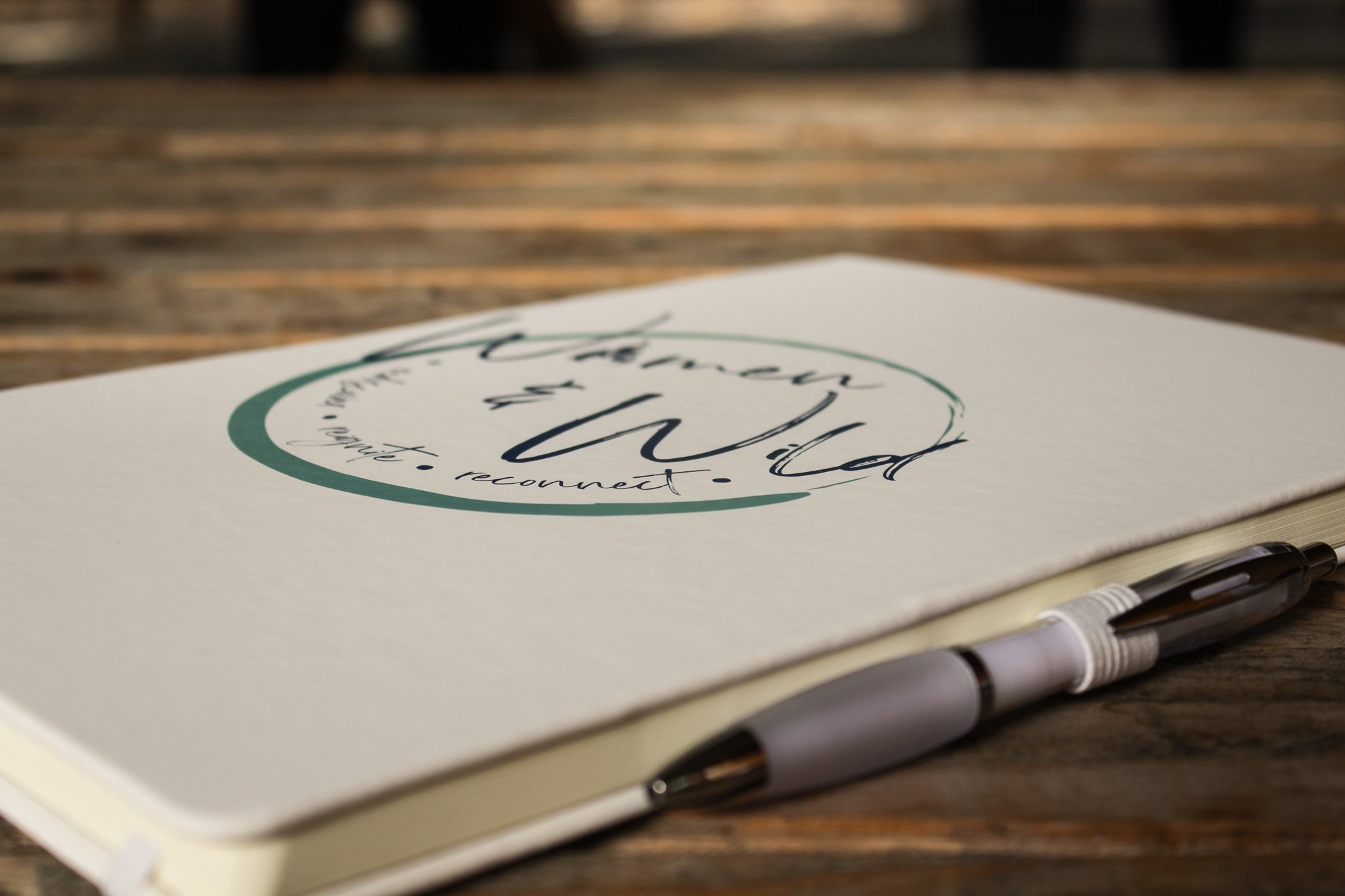 Women & Wild journal and pen for values-based reflection