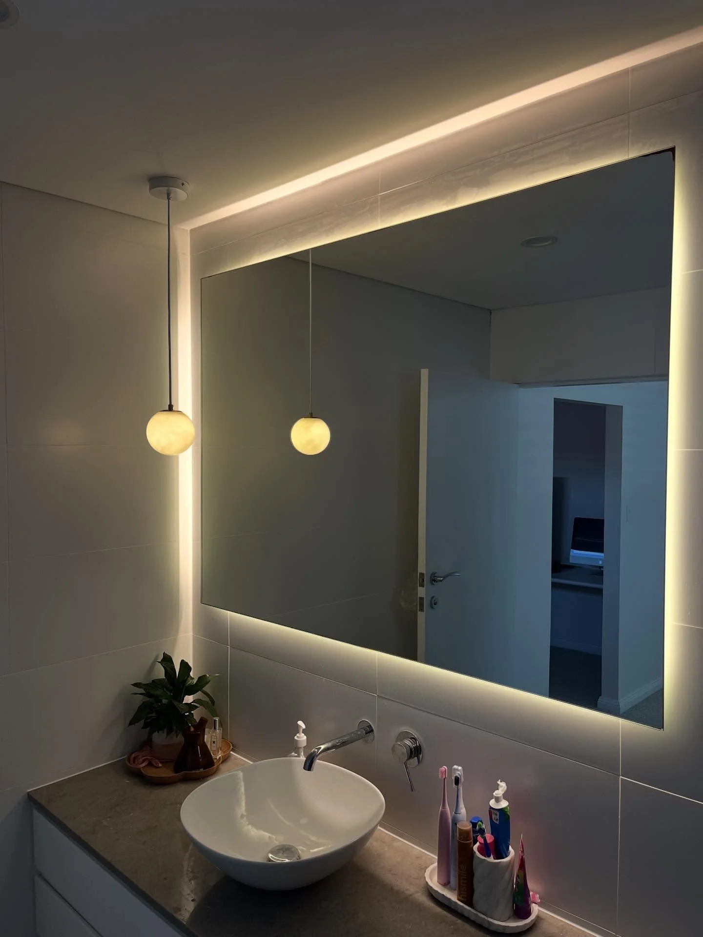 Bright, modern, and functional ⚡️
A recent lighting upgrade for our loyal clients in Maroubra featuring soft backlit mirrors and warm feature lights to elevate everyday spaces.

We&rsquo;re grateful for customers who trust us with their homes time an
