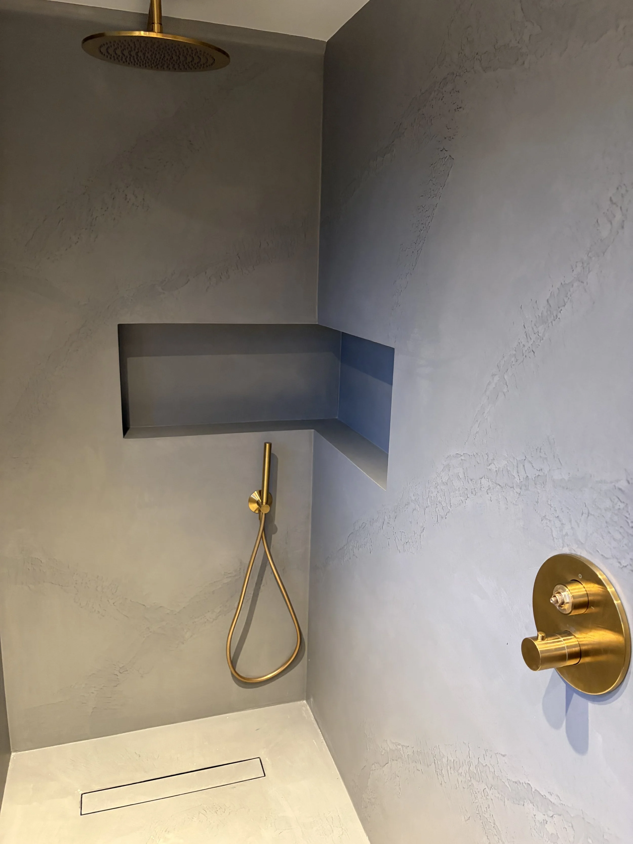 Microcement wet room shower in Knutsford with marble effect