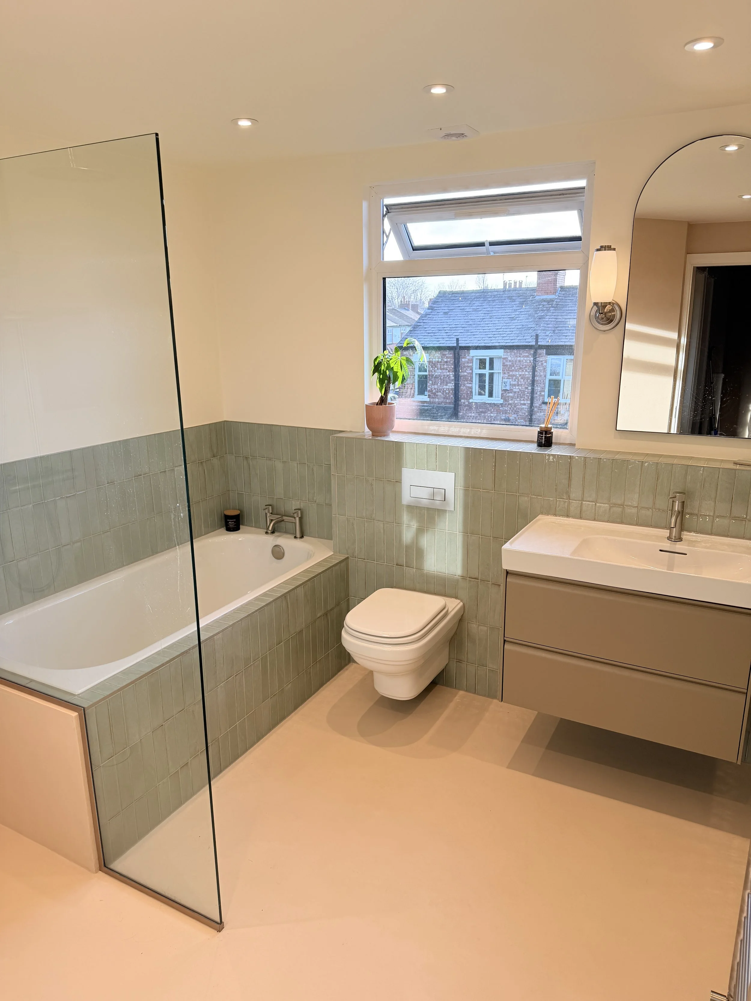 Microcement and tile bathrooms combination in Chorlton