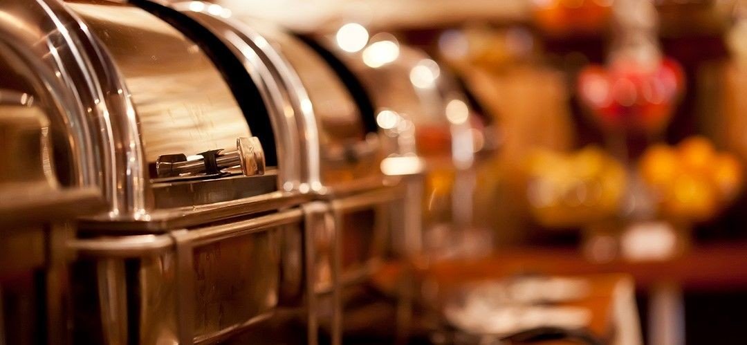 Buffet chafing dishes in a restaurant setting