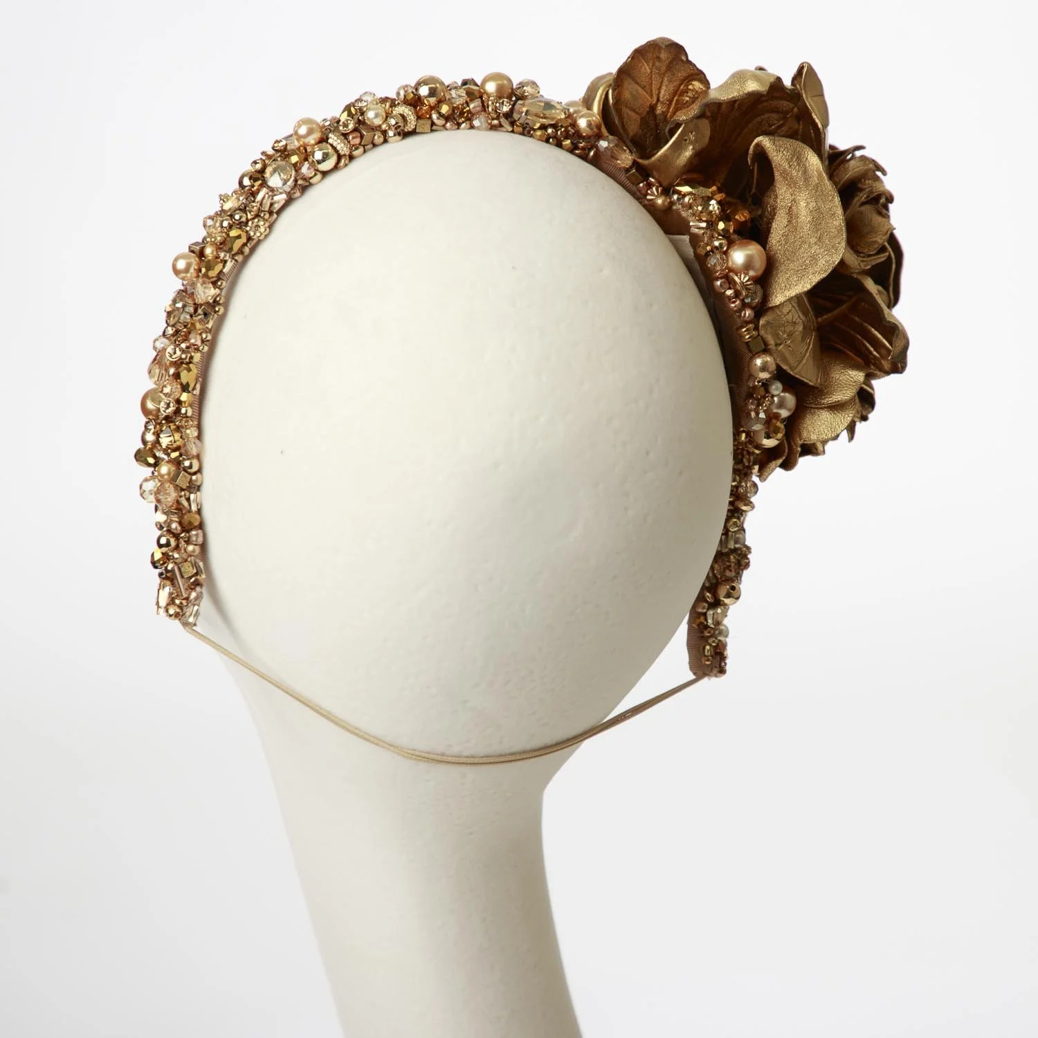 drew-gold-leather-back-angled.jpg