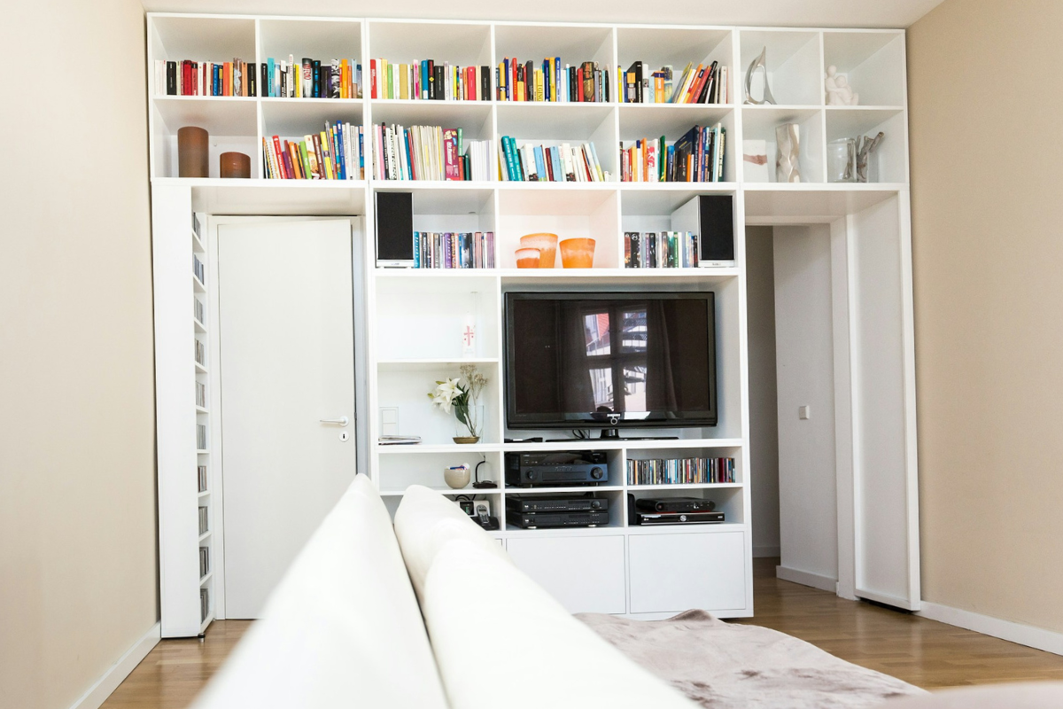 Book shelving in a white living room
