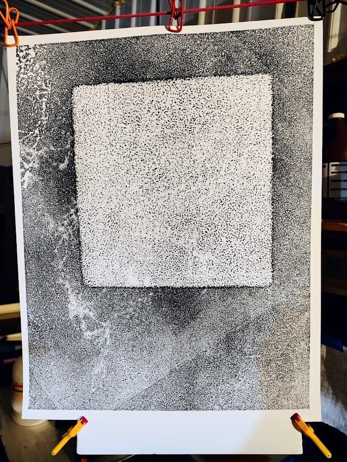 Fresh print in the darkroom. Analog photography.