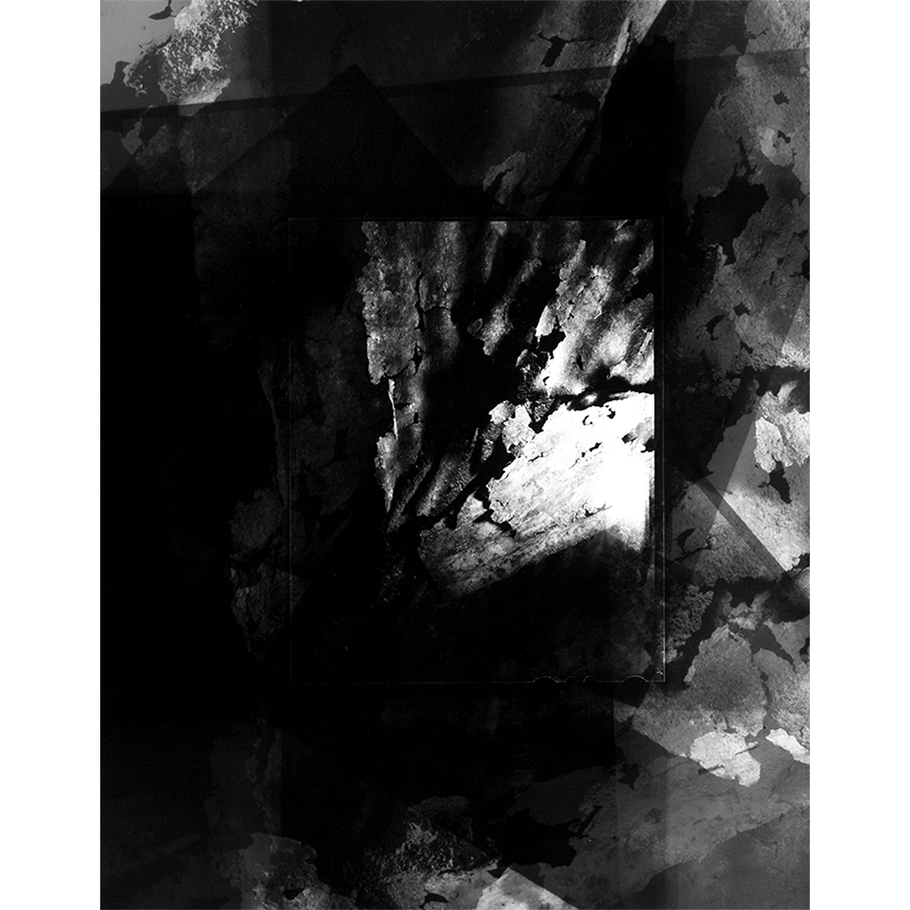 Hand-printed silver gelatin B&W print of rusty metal in an abstract form. Created by Shannon Graham.