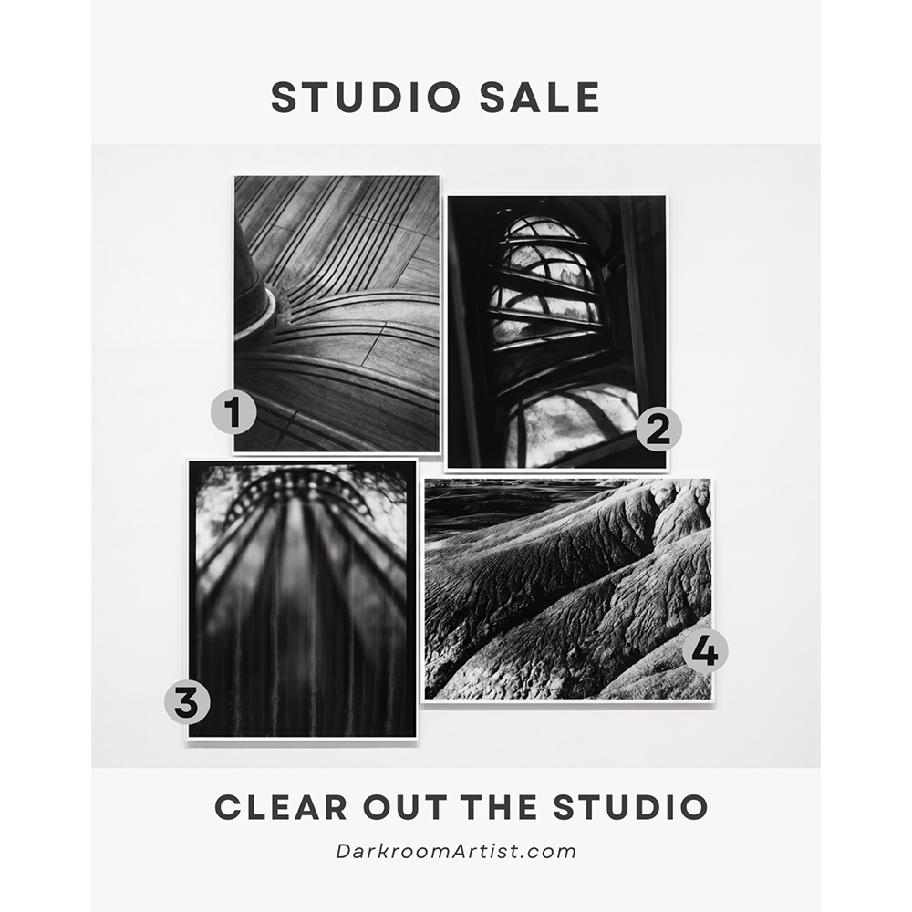 Promotional graphic for the Darkroom Artist studio archive, featuring hand-printed 11x14 black-and-white photographs.